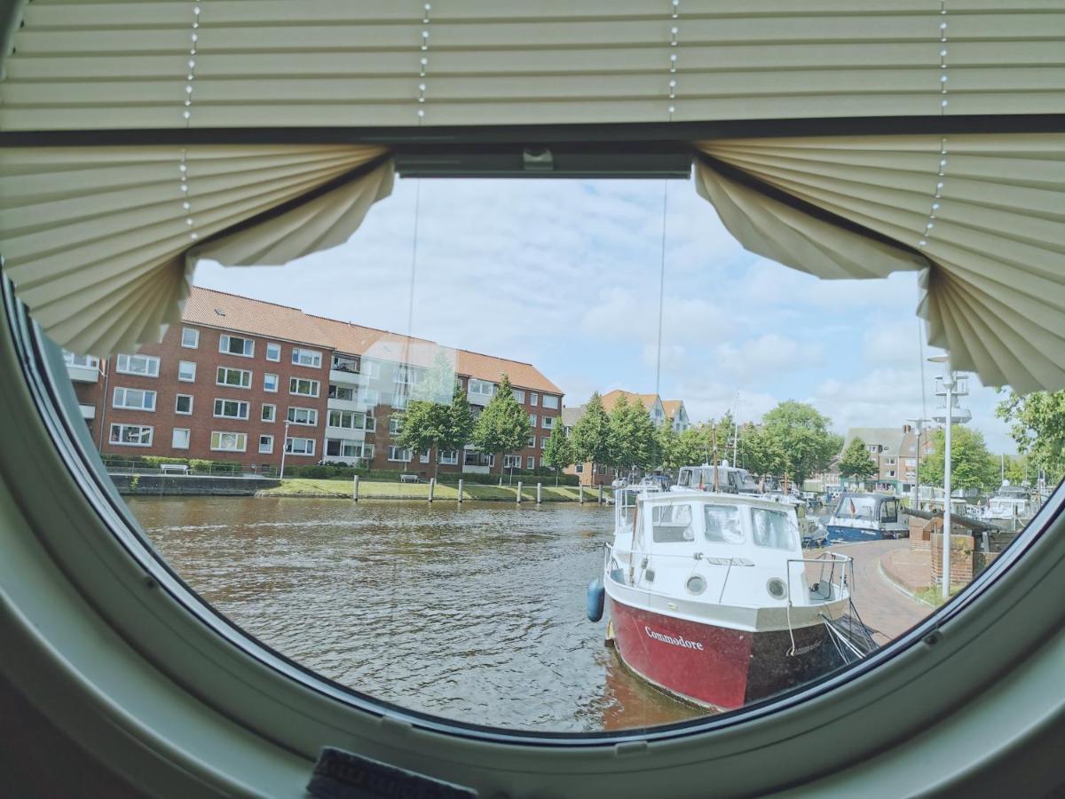 Hausboot Die Leseinsel Emden Esterno foto