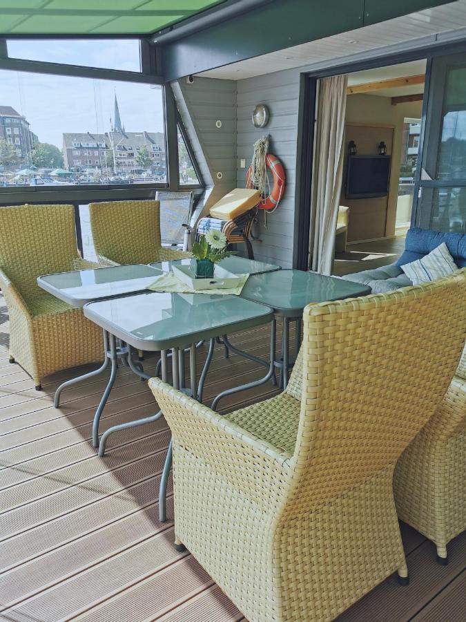 Hausboot Die Leseinsel Emden Esterno foto
